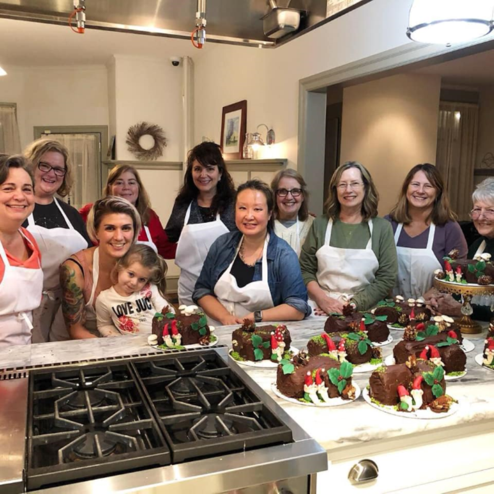 Happy faces at a Yule Log class.