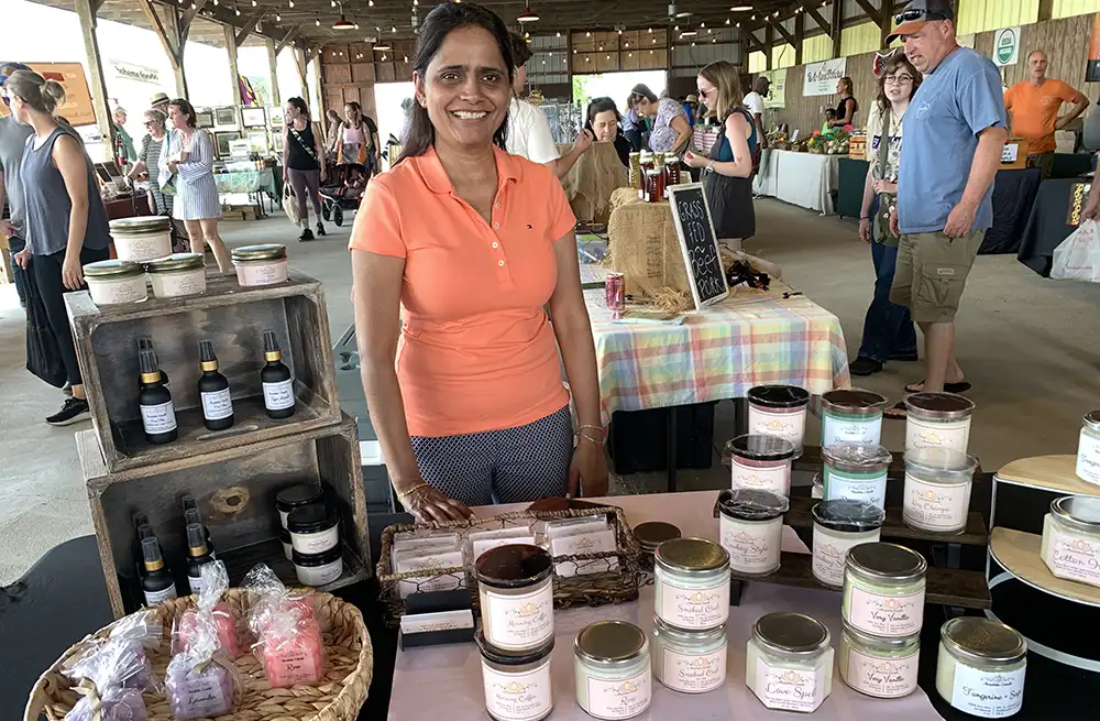 candle and scents vendor at market