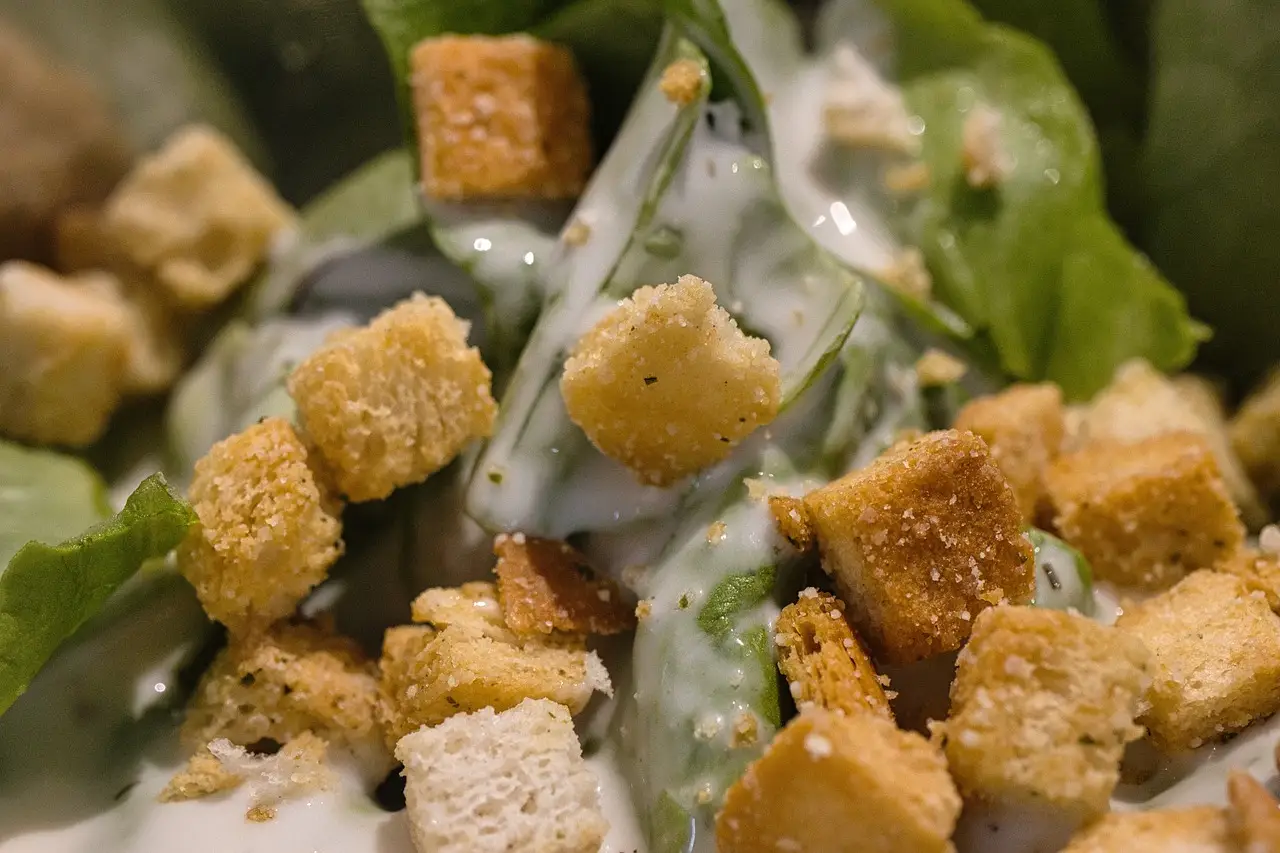 crispy croutons on a green salad