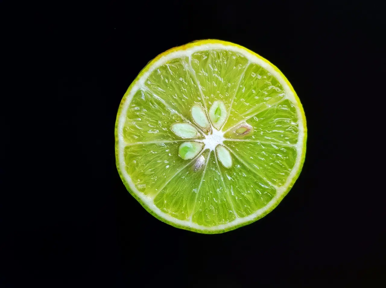lemon cut in half with seeds
