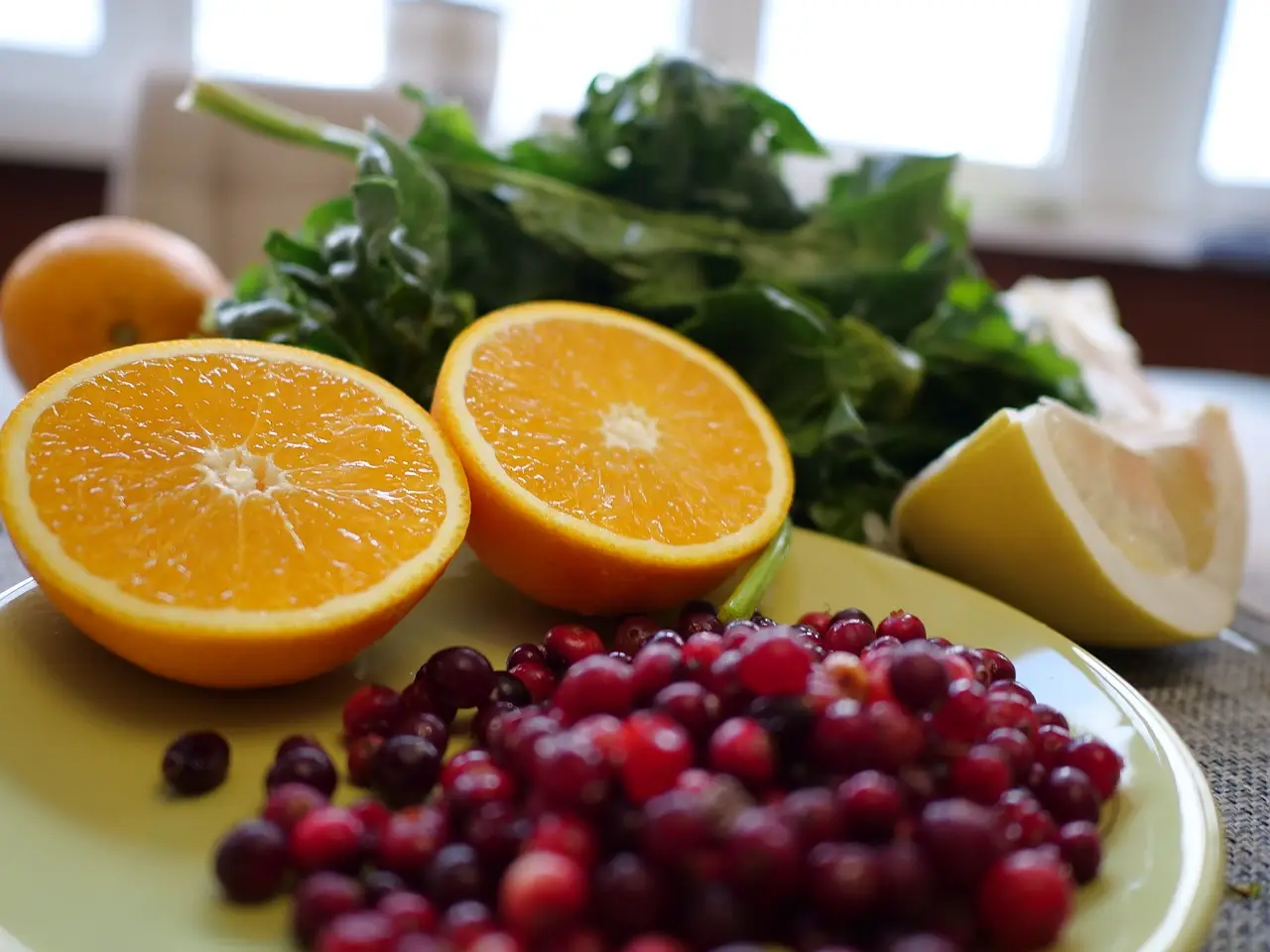 orange halves and red cranberries