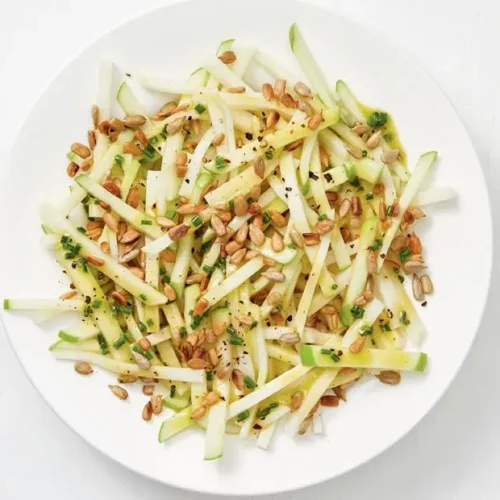 slaw of apple and kohlrabi with sunflower seeds