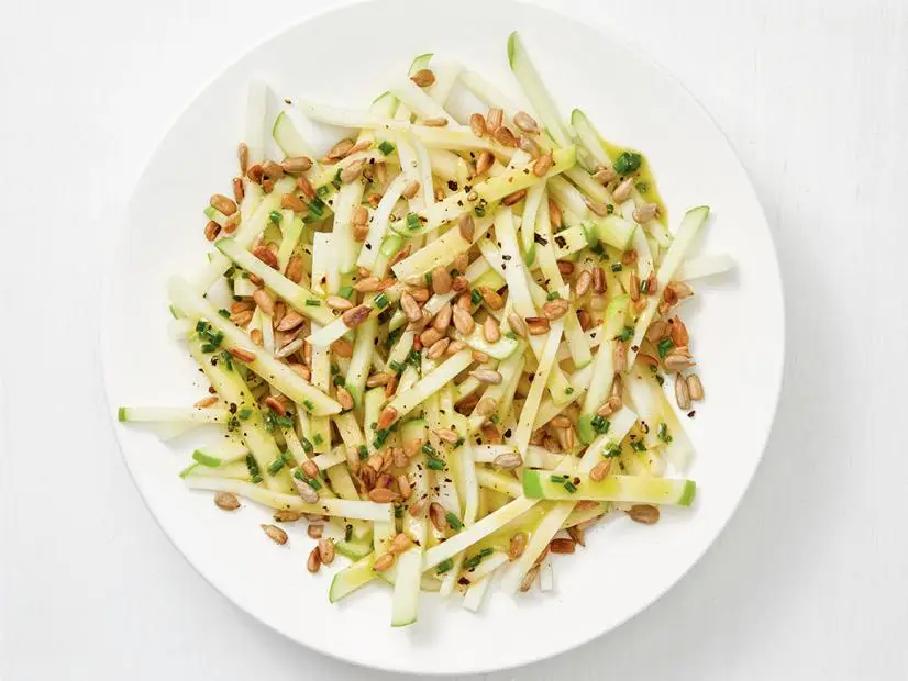 slaw of apple and kohlrabi with sunflower seeds