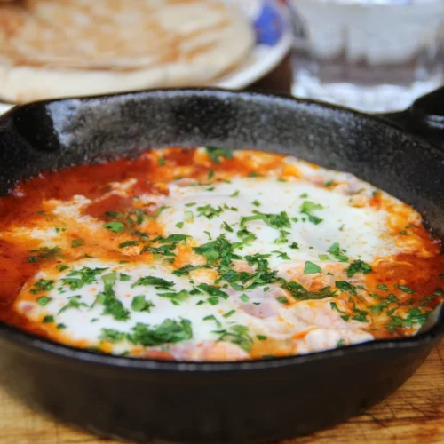 eggs poached in a spicy tomato sauce