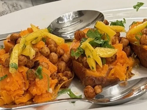 Roasted Yam with Spiced Chickpeas, Mango Slaw and Coconut Lime Cream