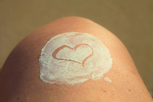 lotion on a leg